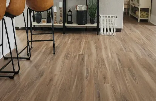 Luxury vinyl plank flooring installed in an open kitchen and living room in Harwinton, CT