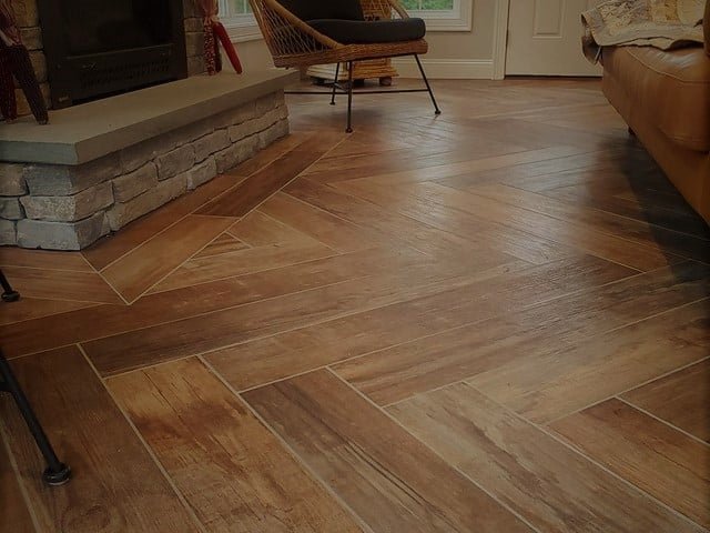 hardwood flooring installed in a beautiful herringbone pattern